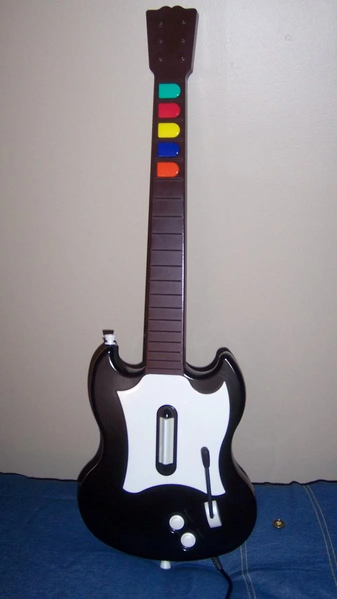 Guitar Hero-gitaarcontroller voor PlayStation 2 met vijf gekleurde knoppen